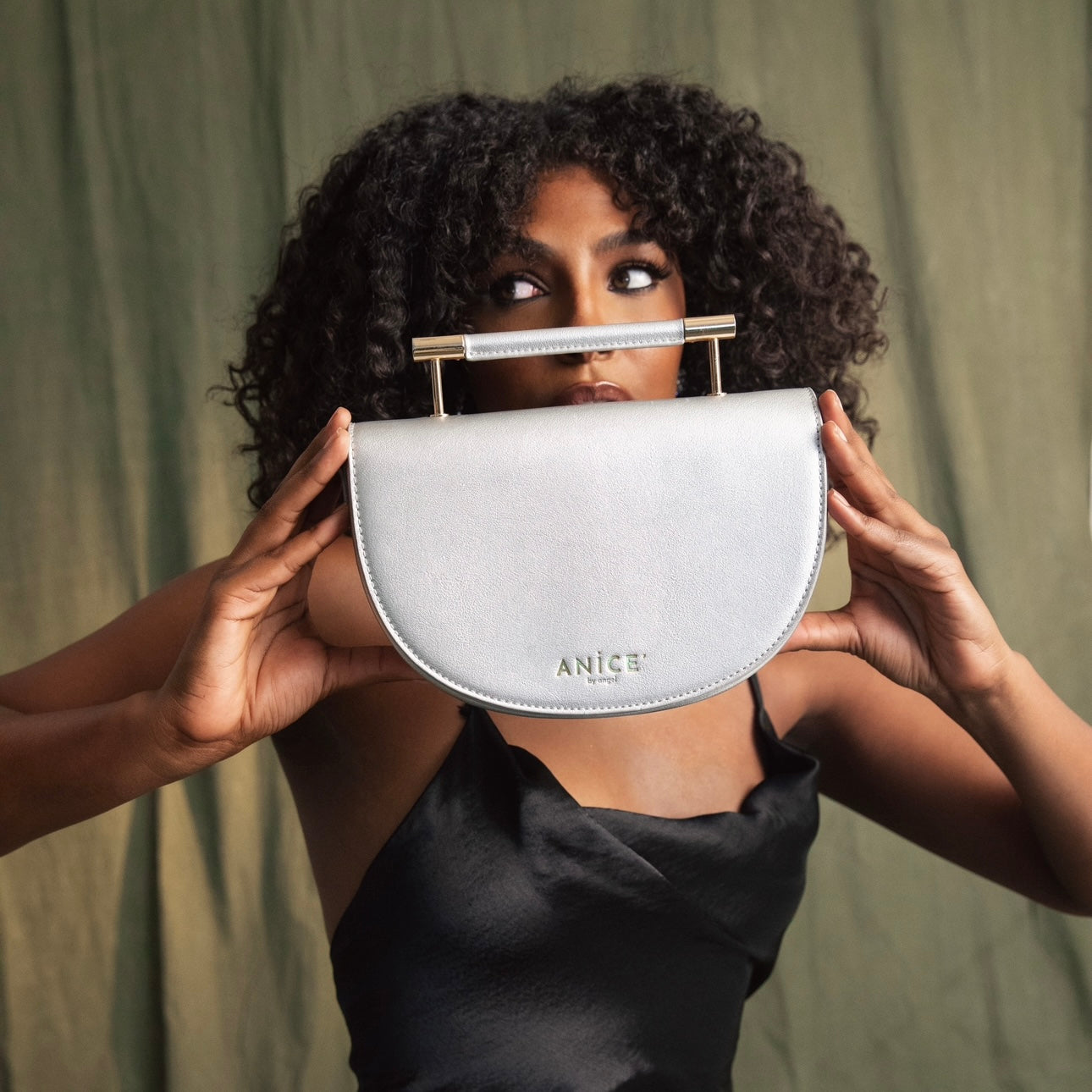 ANiCE’ By Angel SHAKUR Half Moon Metal Leather Top-Handle in Silver image 0