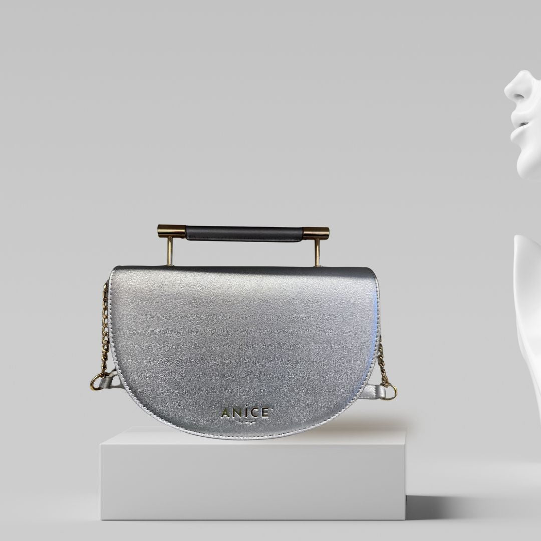 ANiCE’ By Angel SHAKUR Half Moon Metal Leather Top-Handle in Silver image 1