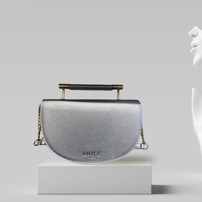 ANiCE’ By Angel SHAKUR Half Moon Metal Leather Top-Handle in Silver image 1