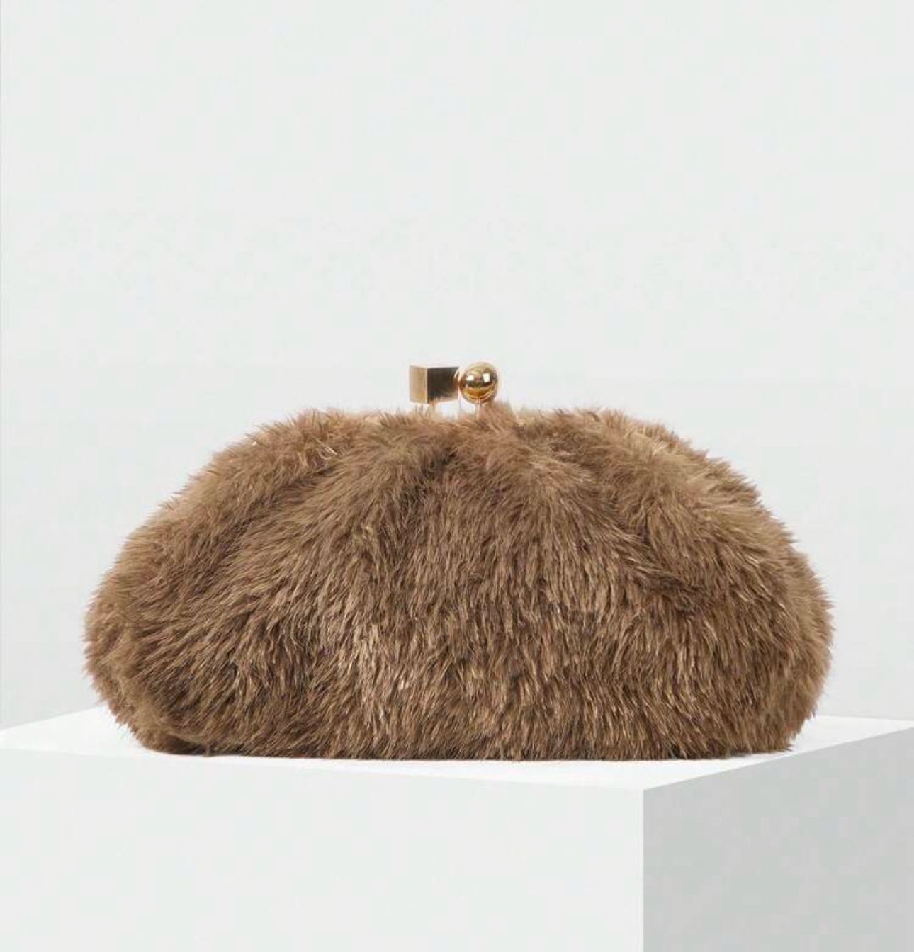 Omari Kisslock Clutch