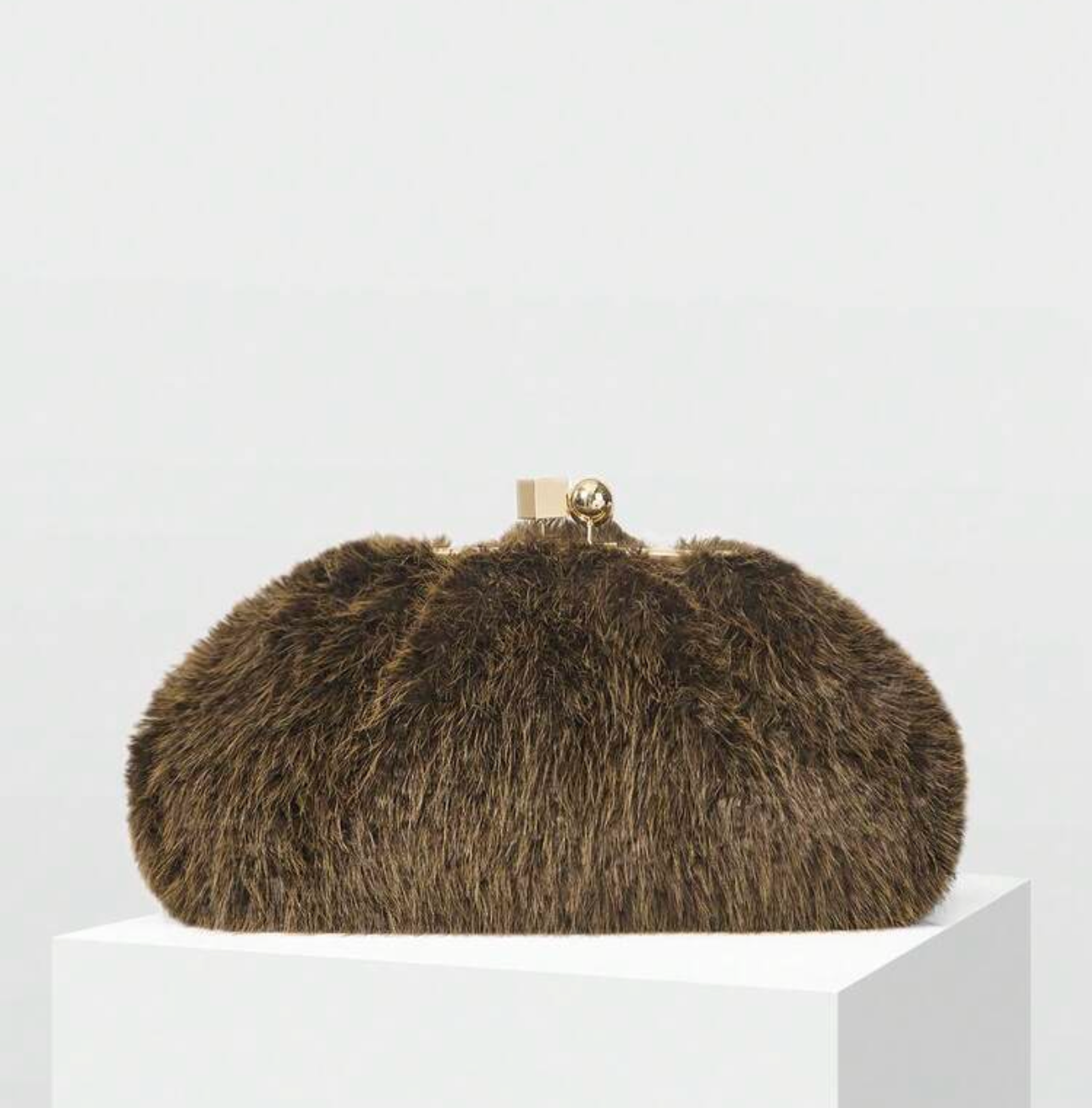 Omari Kisslock Clutch